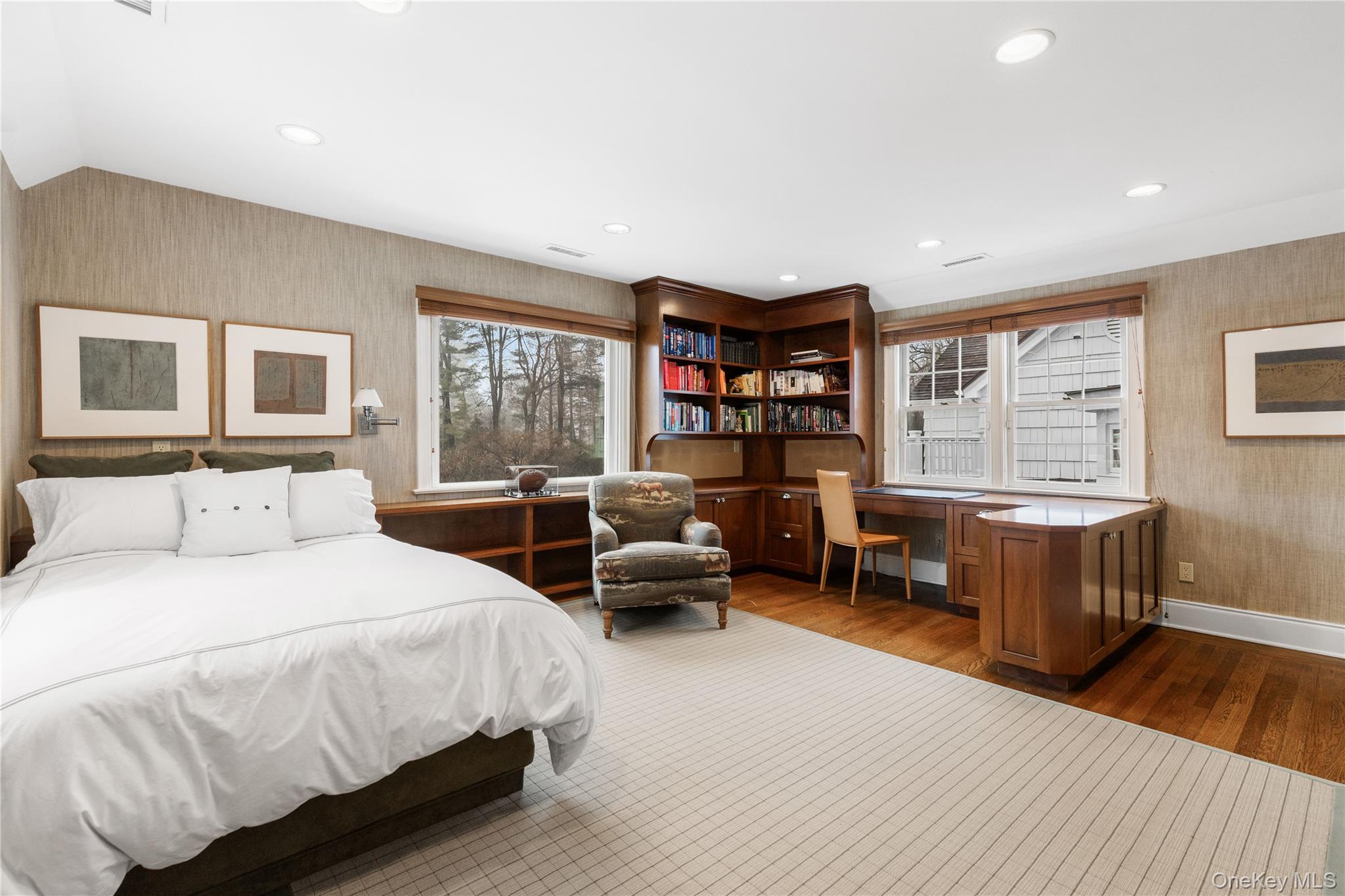 25 Stratford Road Harrison, NY 10528 - Photo 34 of 47 a bedroom with a bed and a large window