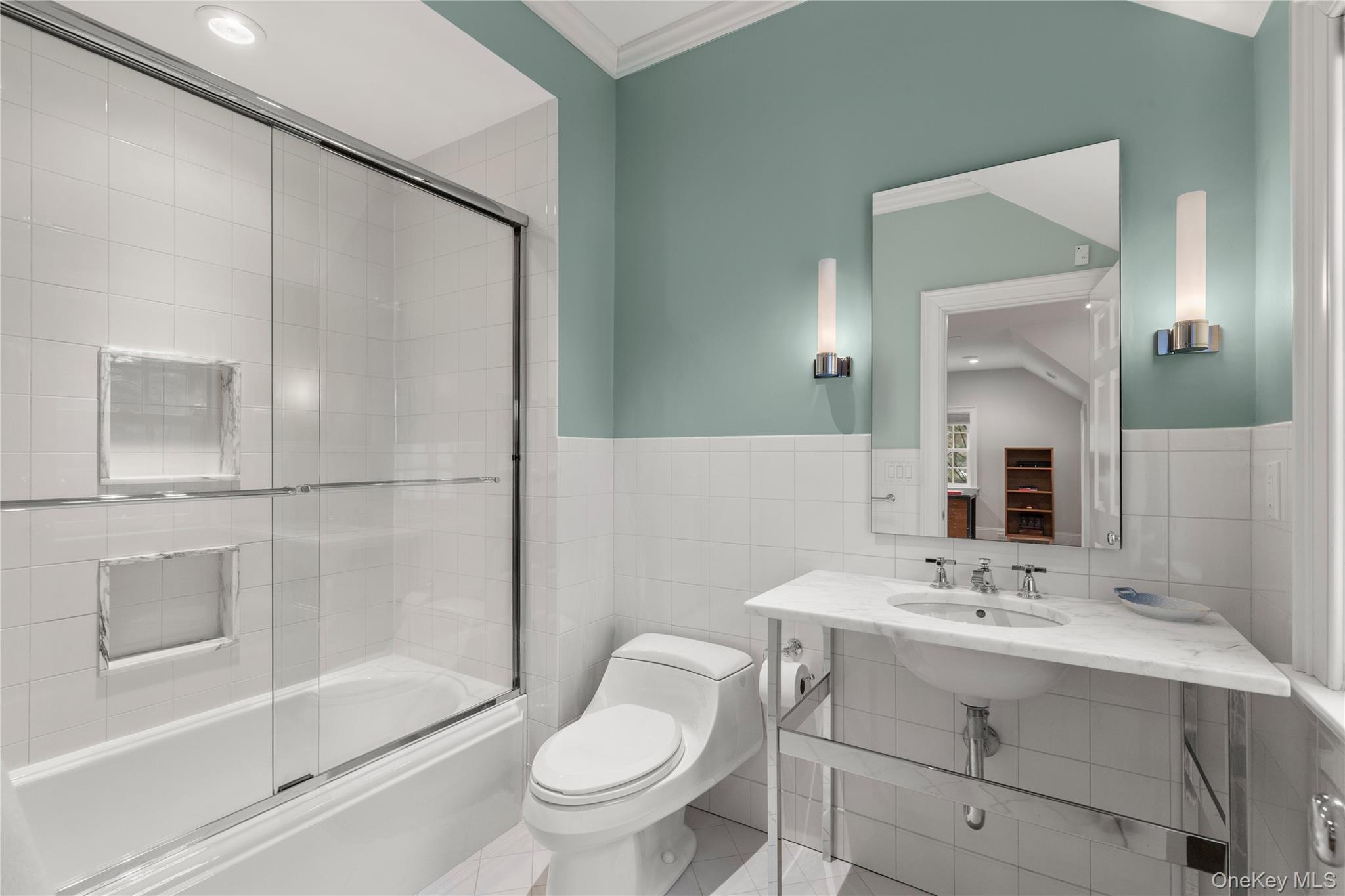 25 Stratford Road Harrison, NY 10528 - Photo 38 of 47 a bathroom with a sink toilet and shower