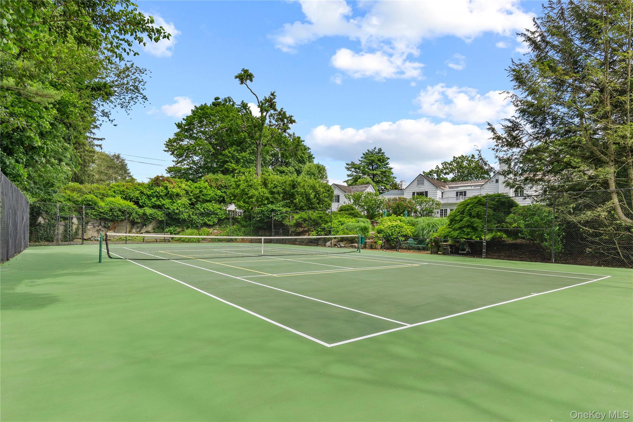 25 Stratford Road Harrison, NY 10528 - Photo 43 of 47 a view of a tennis court