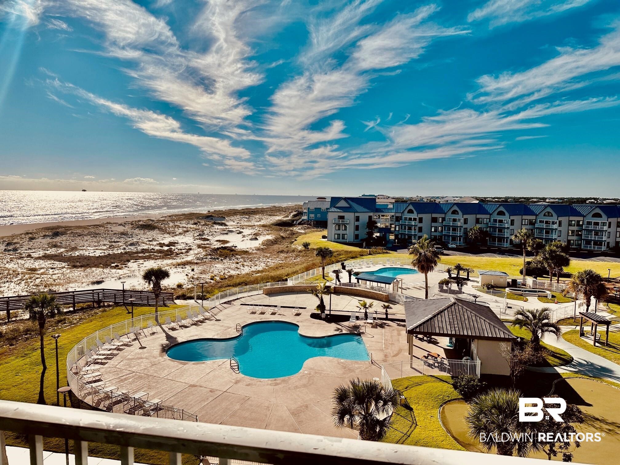 375 Plantation Road, Unit 5406 Gulf Shores, AL 36542 - Photo 3 of 23 Pool with a beach view, fence, a water view, and a patio
