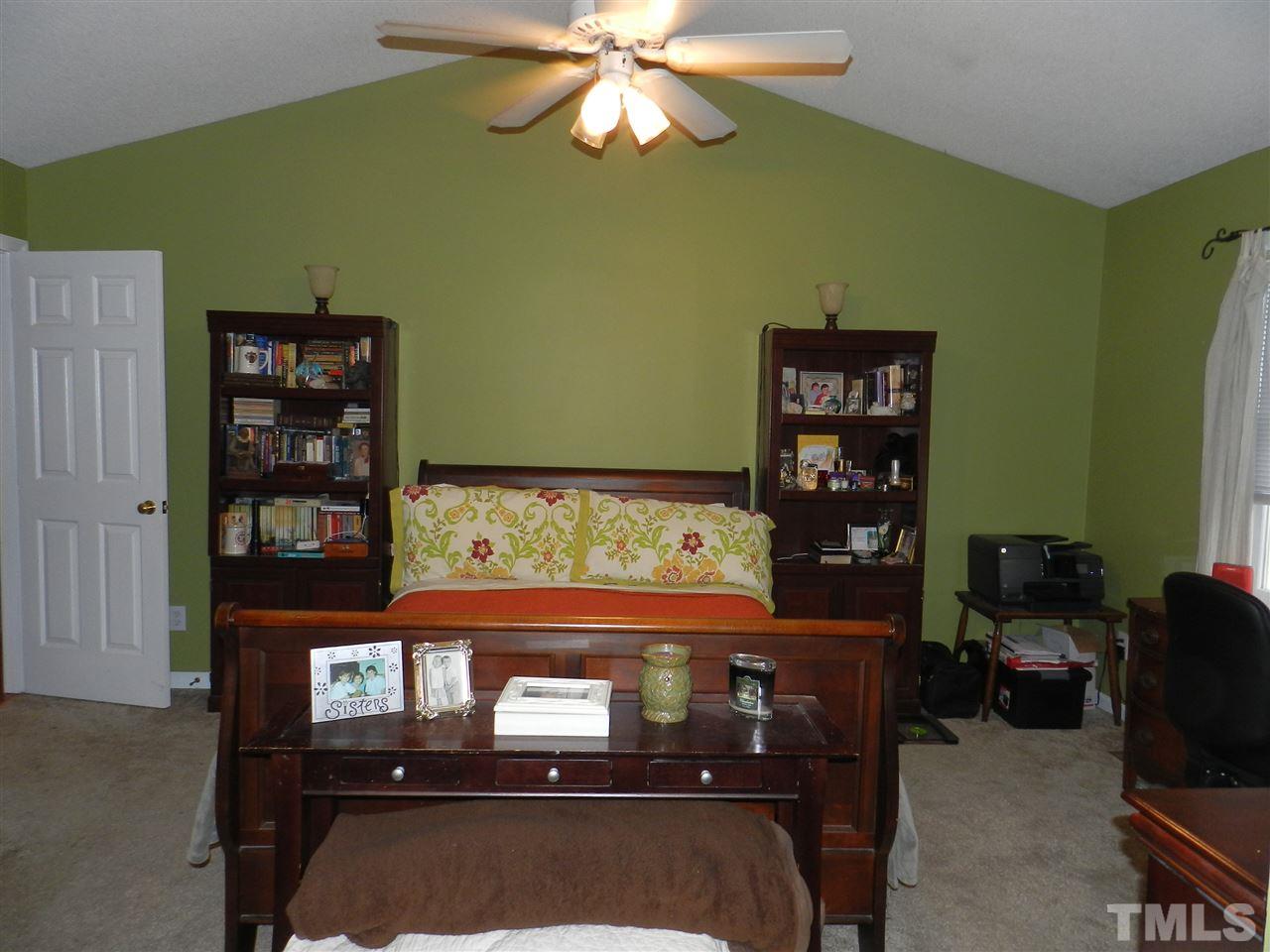 4308 Rockside Hills Drive Raleigh, NC 27603 - Photo 14 of 25 a living room with furniture and decor