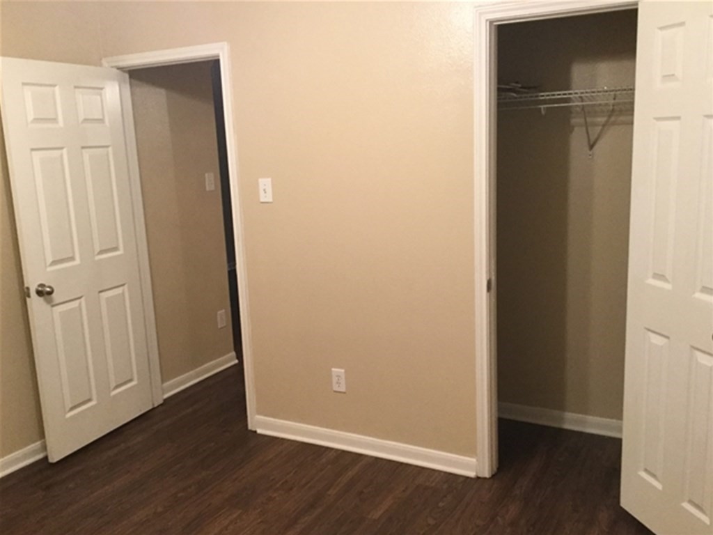23511 Hidden Maple Drive Spring, TX 77373 - Photo 12 of 18 an empty room with wooden floor