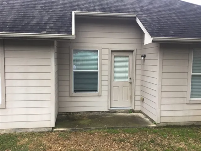 a view of house with a door