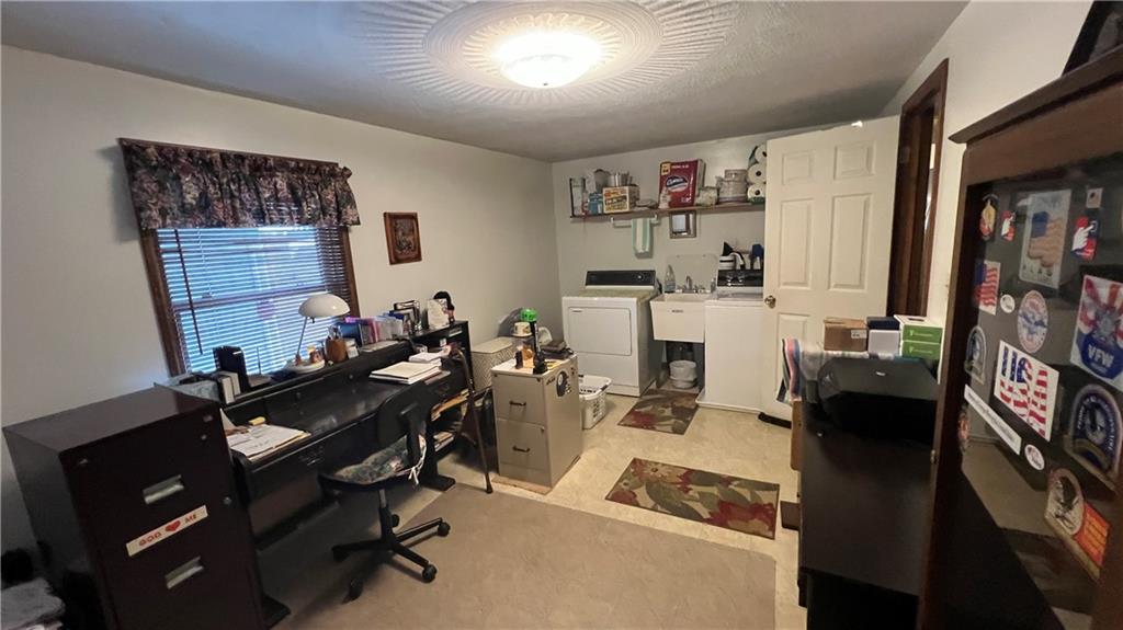 3356 Miola Road Clarion, PA 16214 - Photo 3 of 27 a view of a workspace with furniture and toys