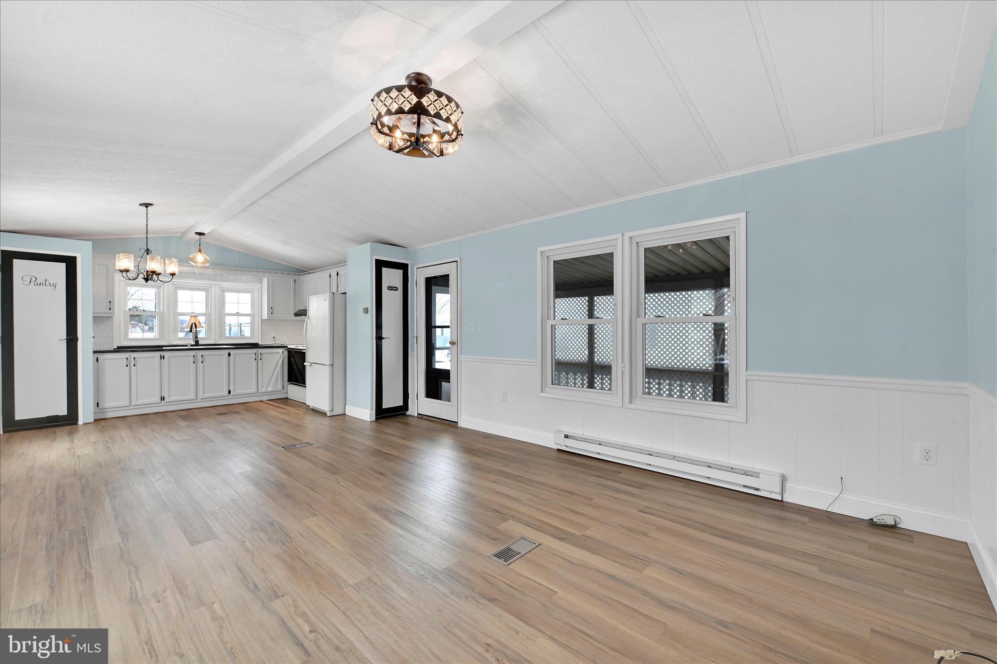 137 Meadow Valley Road Ephrata, PA 17522 - Photo 11 of 31 a view of a big room with wooden floor and windows