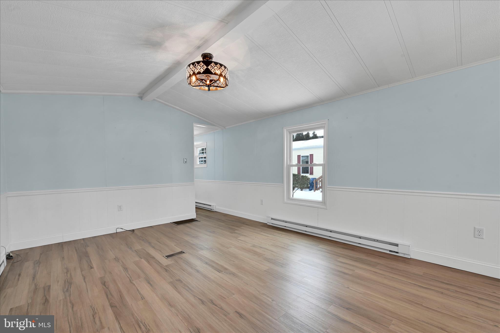 137 Meadow Valley Road Ephrata, PA 17522 - Photo 13 of 31 an empty room with wooden floor and window