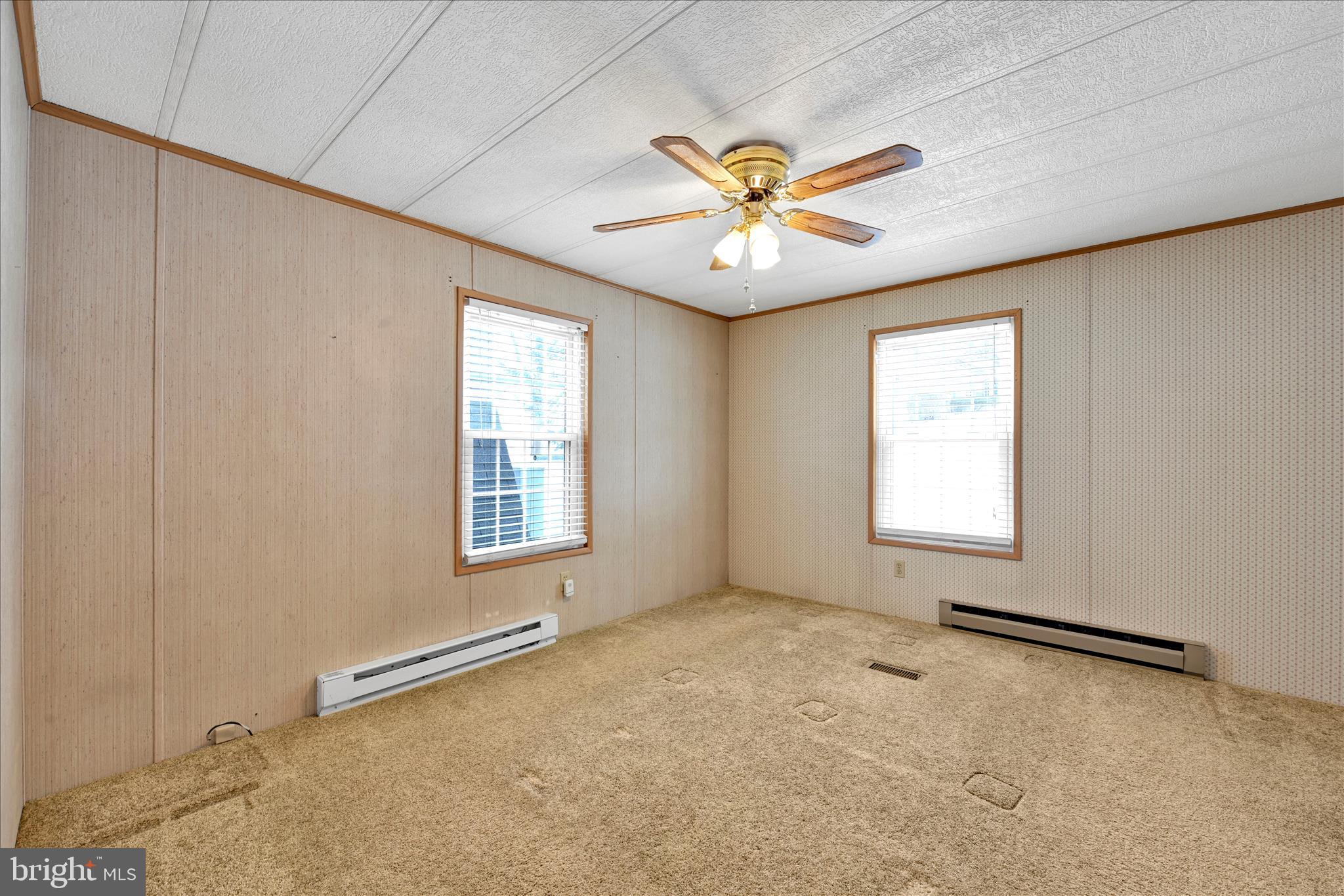 137 Meadow Valley Road Ephrata, PA 17522 - Photo 21 of 31 an empty room with windows and fan view