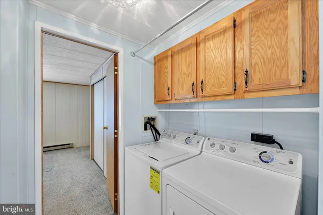 a view of utility room with washer and dryer