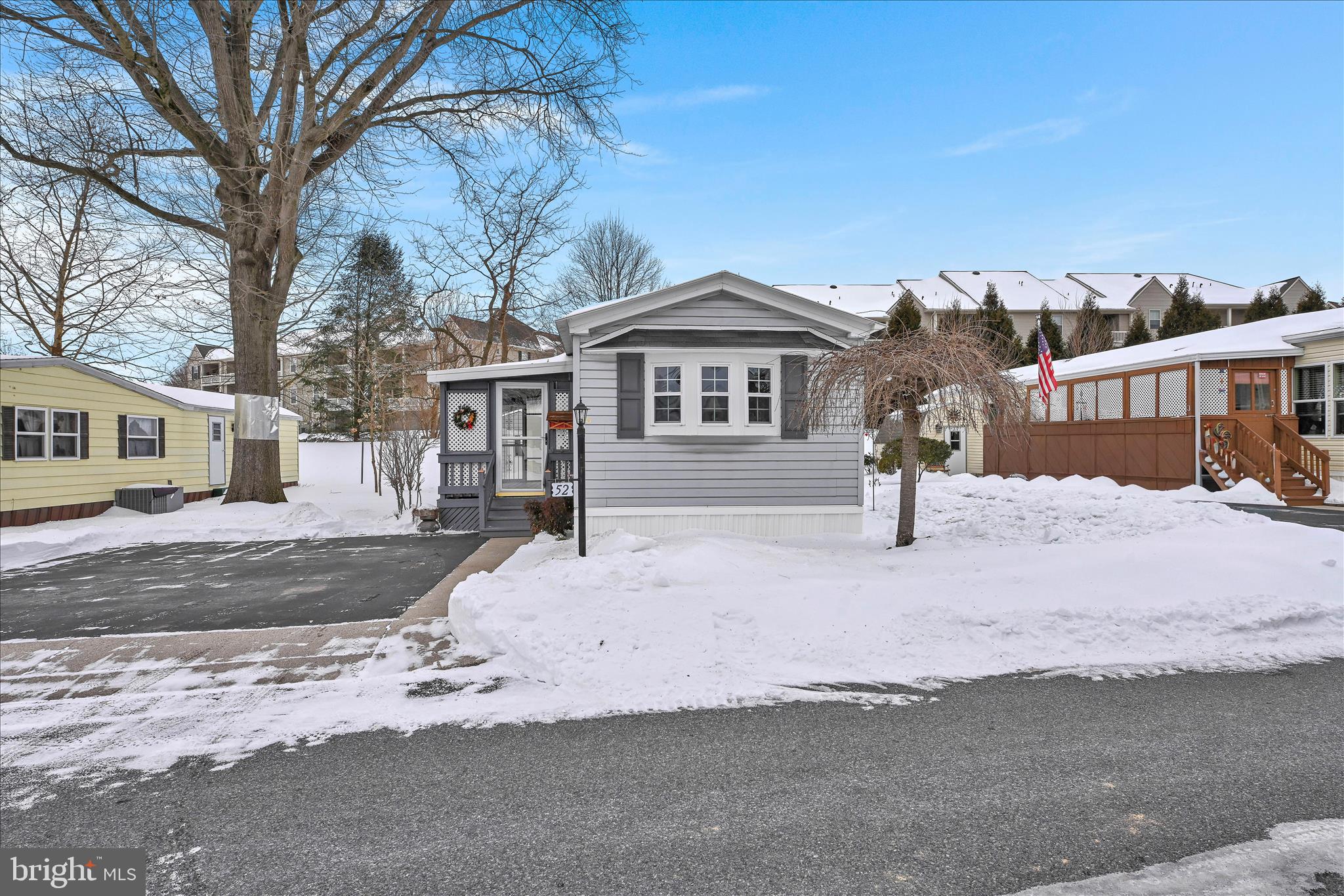 137 Meadow Valley Road Ephrata, PA 17522 - Photo 3 of 31 a front view of a house with a yard covered in snow