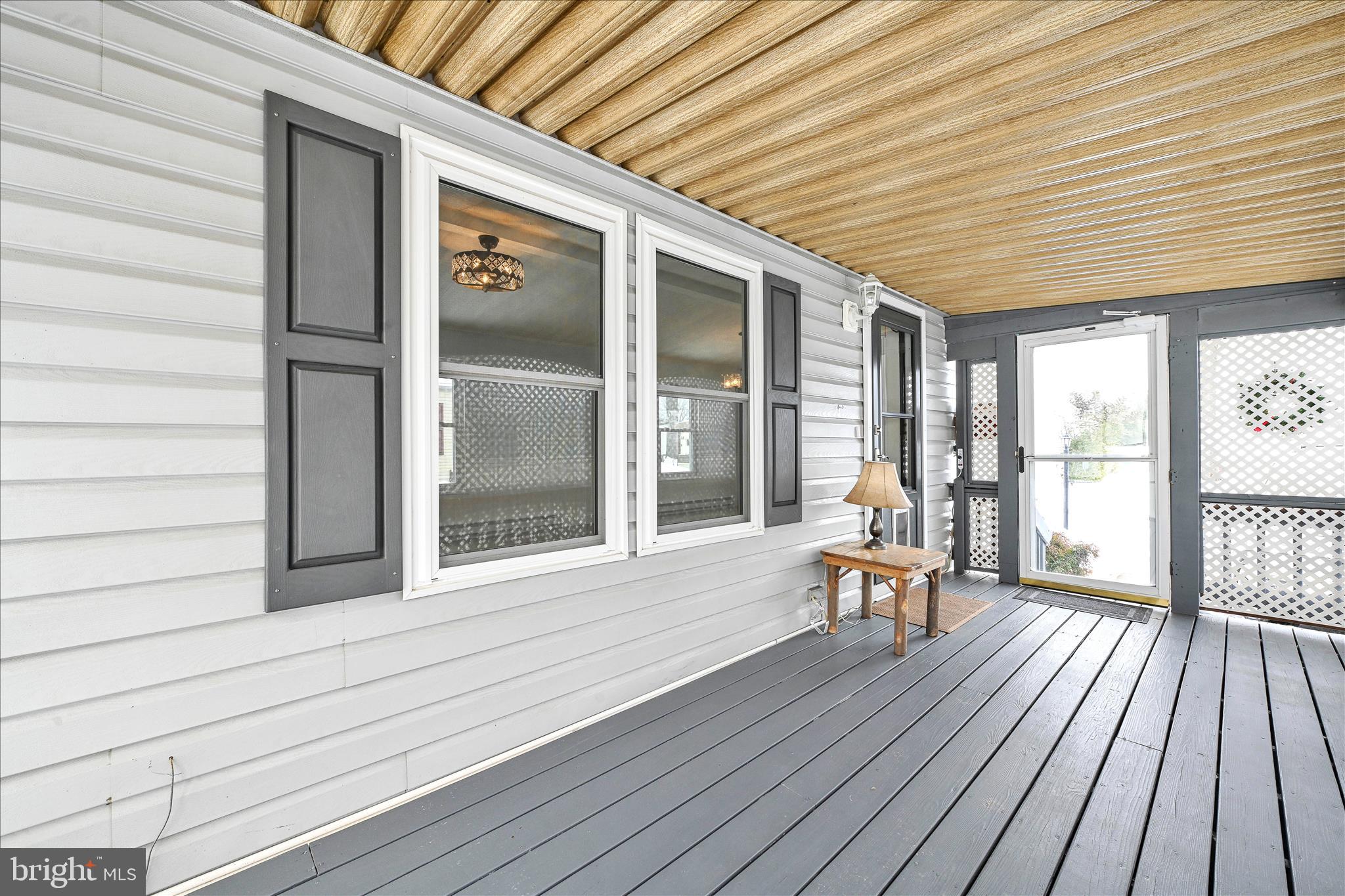 137 Meadow Valley Road Ephrata, PA 17522 - Photo 9 of 31 wooden floor to ceiling window and wooden floor
