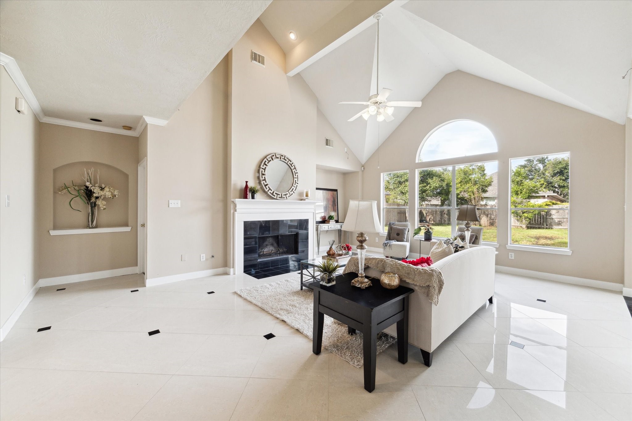 1818 Cross Spring Drive Sugar Land, TX 77479 - Photo 10 of 32 a living room with furniture and a fireplace