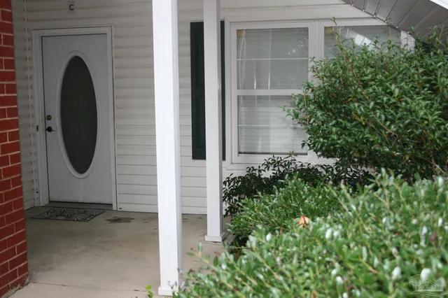 a close view of a utility room with washer and dryer