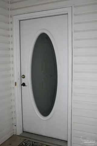 a kitchen with stainless steel appliances granite countertop a refrigerator sink and cabinets