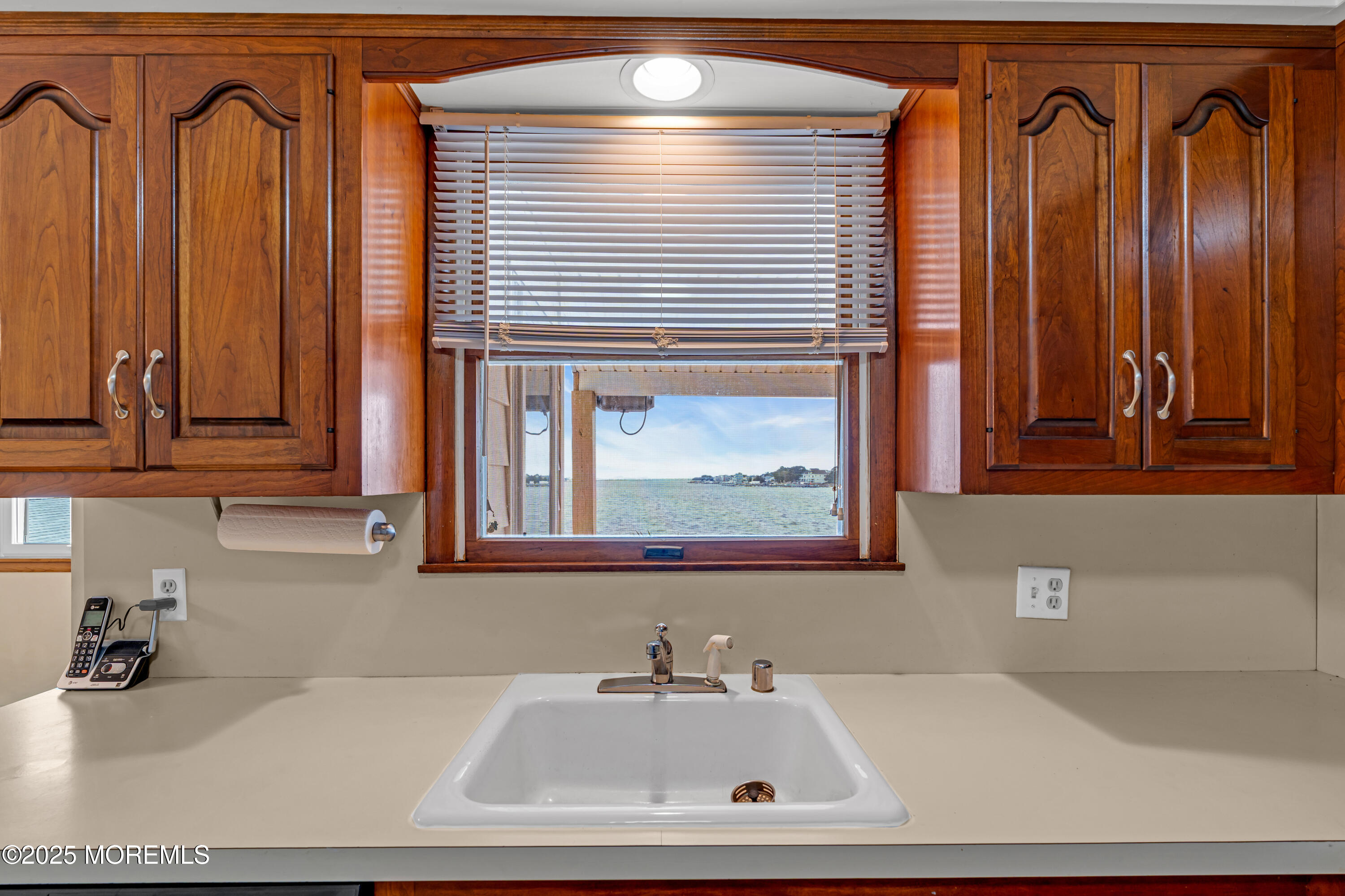 5 Bay Way Brick, NJ 08723 - Photo 15 of 61 a bathroom with a sink and a mirror