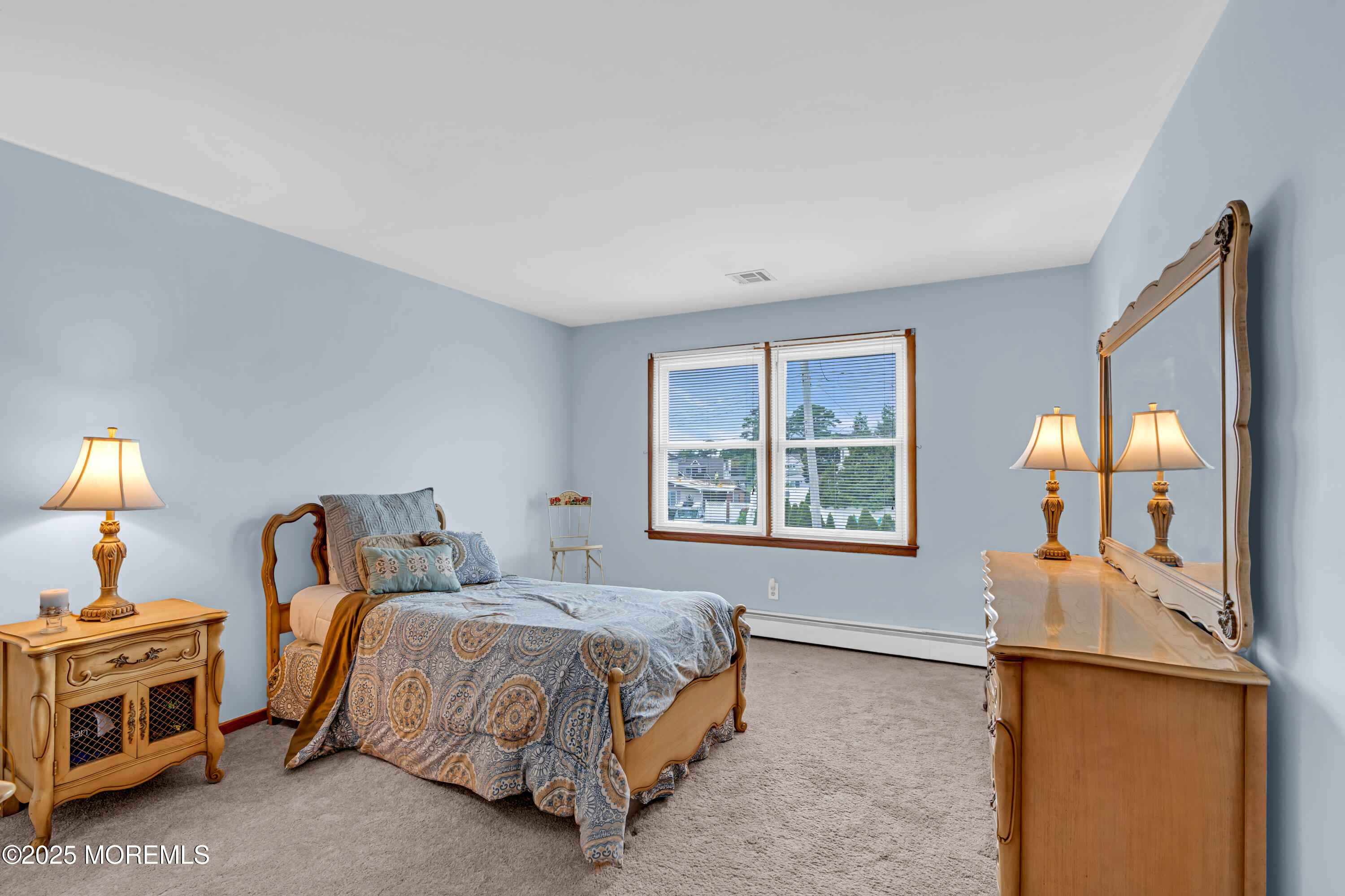 5 Bay Way Brick, NJ 08723 - Photo 25 of 61 a bedroom with a bed and a dresser next to a window