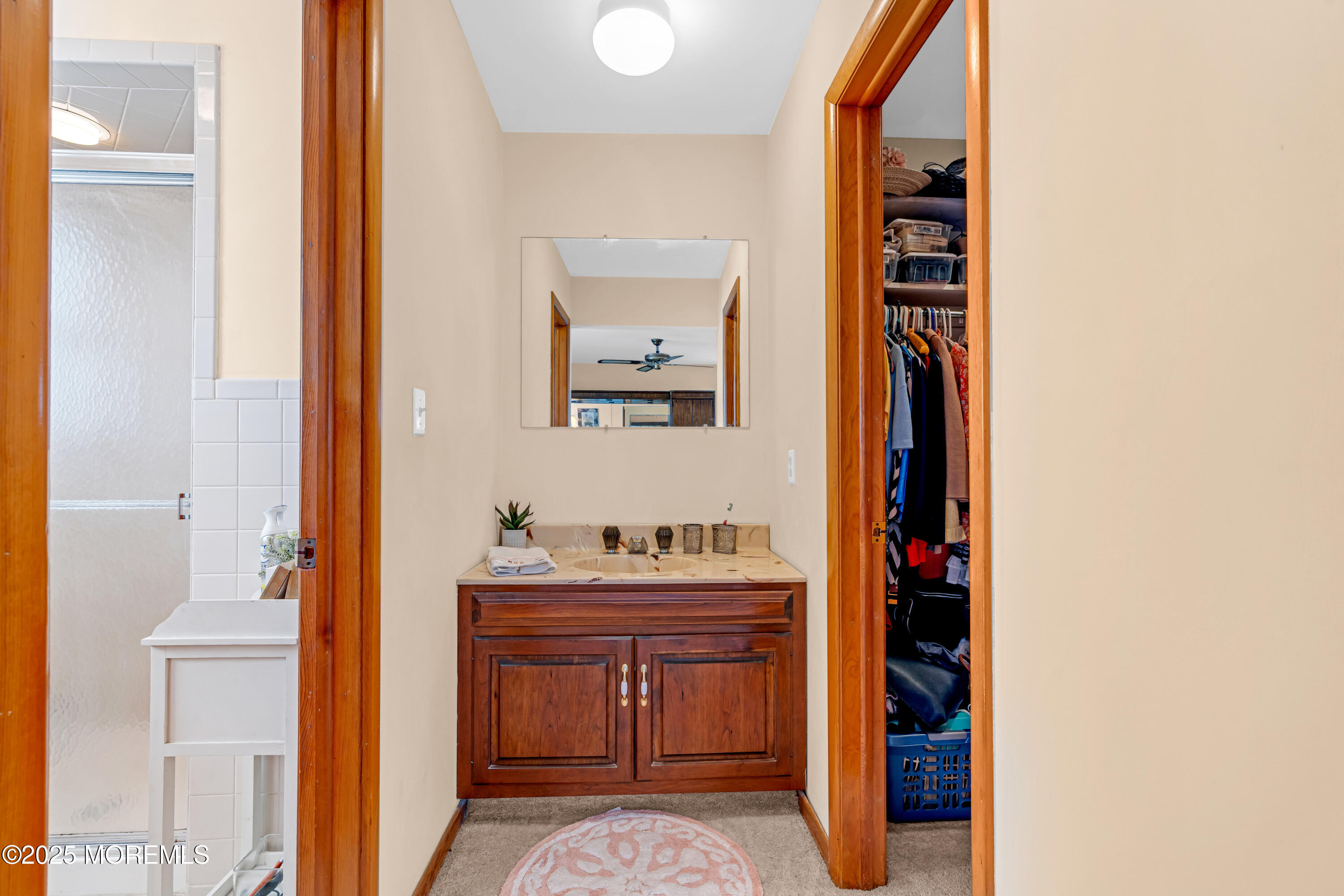 5 Bay Way Brick, NJ 08723 - Photo 31 of 61 a bathroom with a sink and a mirror