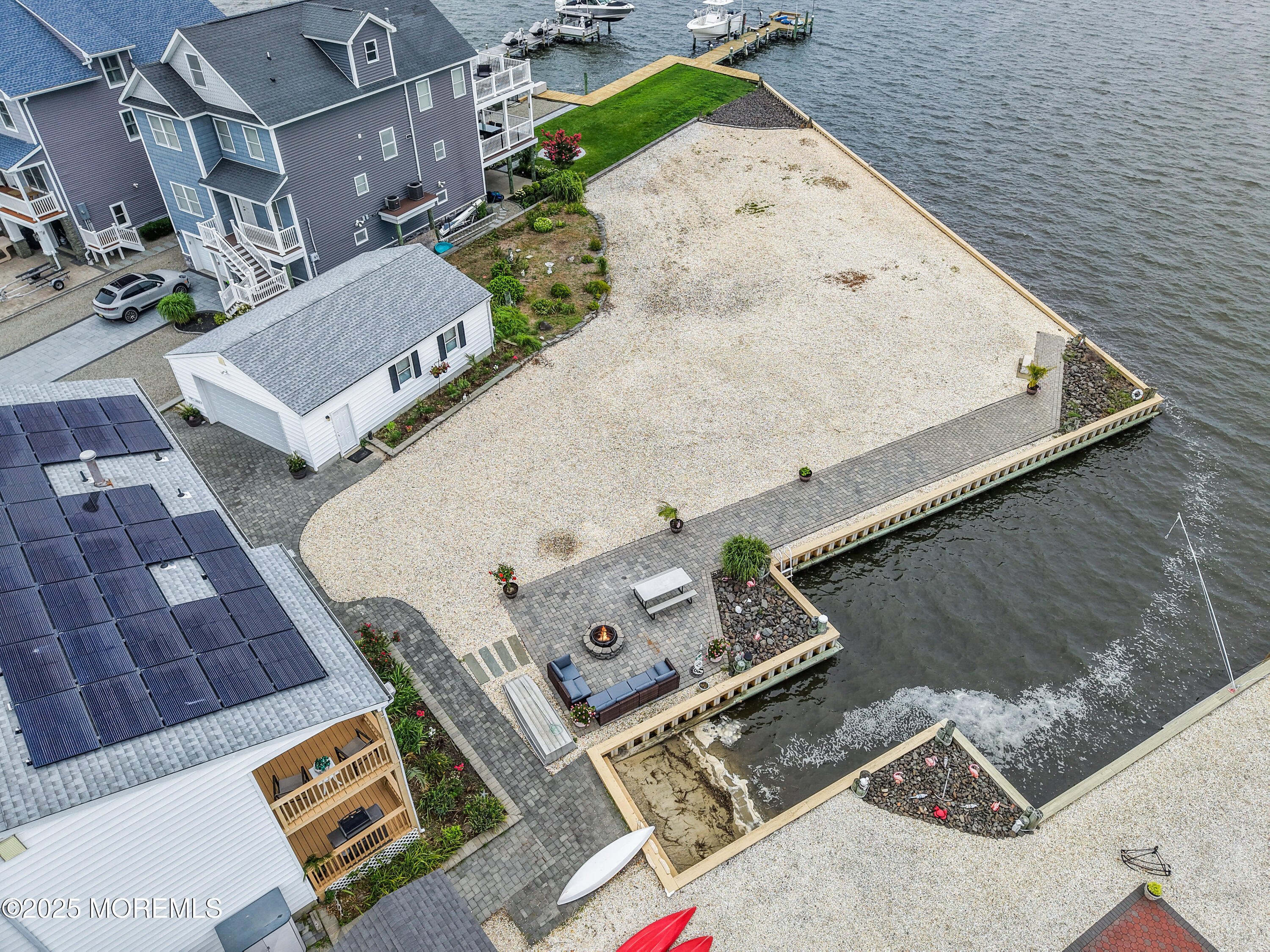 5 Bay Way Brick, NJ 08723 - Photo 43 of 61 an aerial view of a house with a yard and furniture