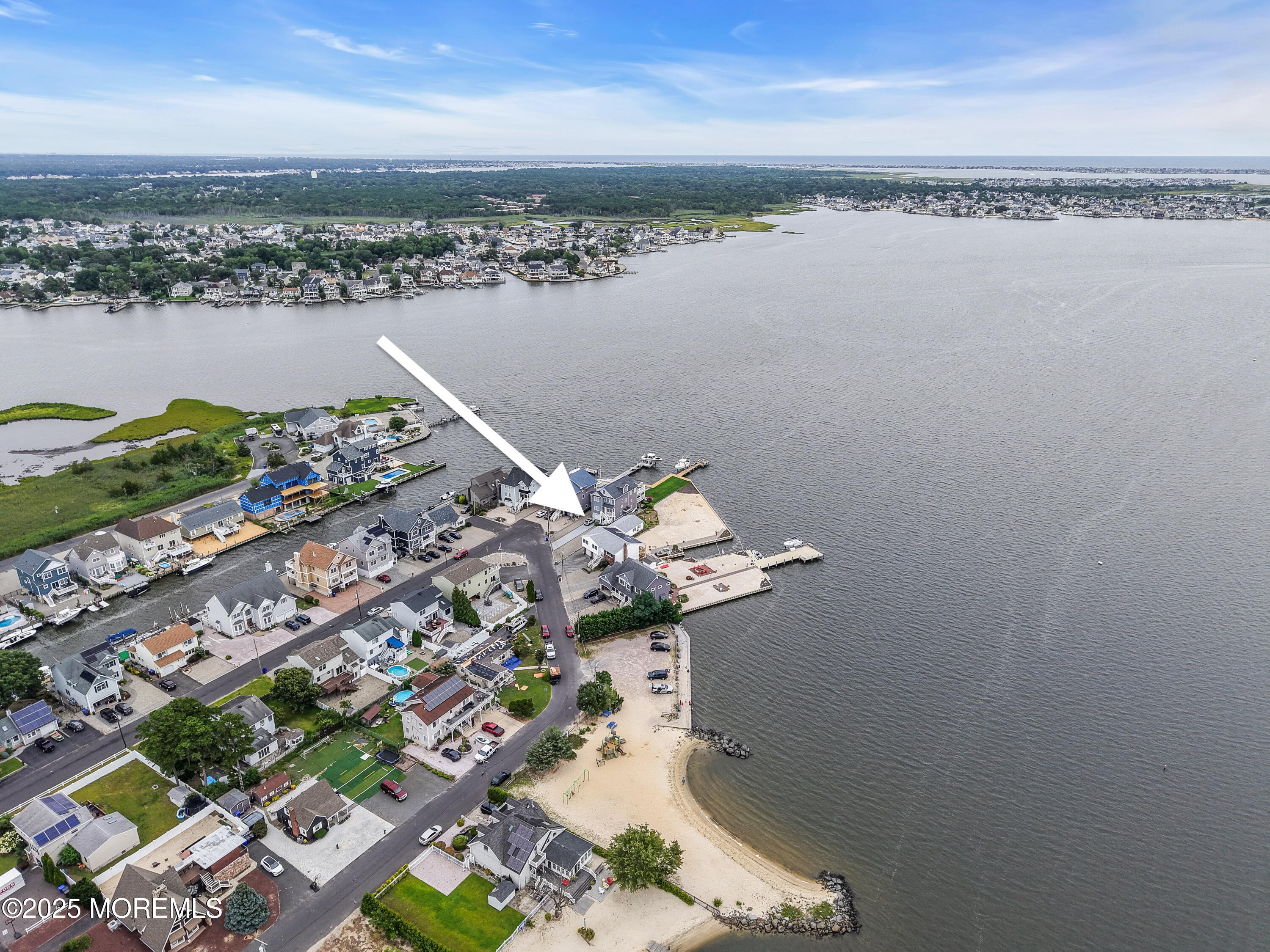 5 Bay Way Brick, NJ 08723 - Photo 58 of 61 a view of a lake with a city