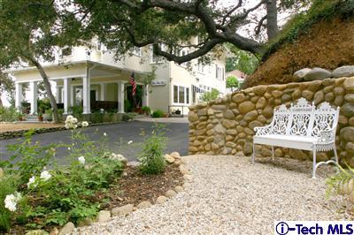 Undisclosed Address South Pasadena, CA 91030 - Photo 2 of 15 a front view of a house with a yard