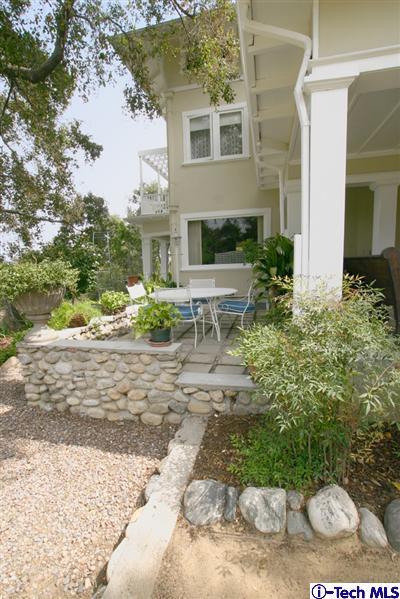 Undisclosed Address South Pasadena, CA 91030 - Photo 4 of 15 a view of a backyard with plants and a patio