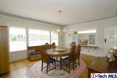 Undisclosed Address South Pasadena, CA 91030 - Photo 6 of 15 a dining room with furniture a chandelier and wooden floor