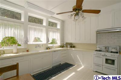Undisclosed Address South Pasadena, CA 91030 - Photo 8 of 15 a kitchen with a sink cabinets and window