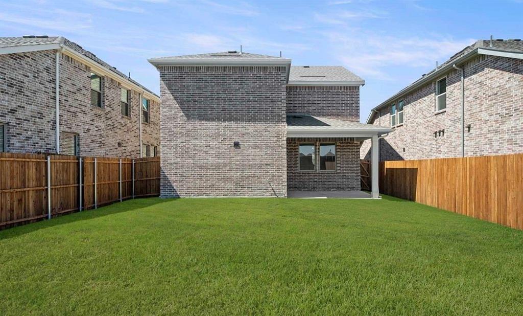 14201 Gallatin Street Pilot Point, TX 76258 - Photo 3 of 12 Rear Exterior Design Representative Photo