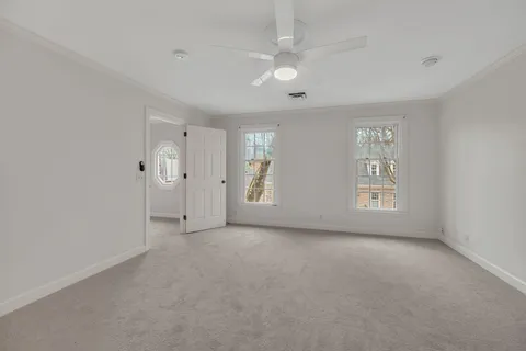 a bathroom with a glass shower door
