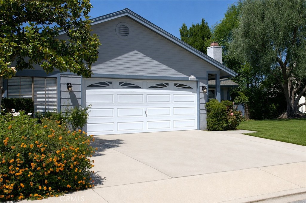 28015 Tupelo Ridge Drive Valencia, CA 91354 - Photo 2 of 41 Digitally enhanced, sod at right of driveway