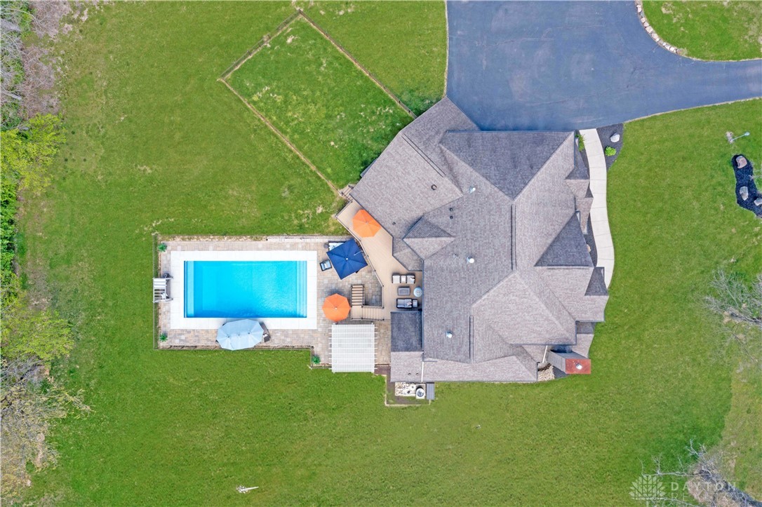 4096 Middle Urbana Road Urbana, OH 43078 - Photo 59 of 96 An aerial view showcases a house with a pool and lush surroundings.