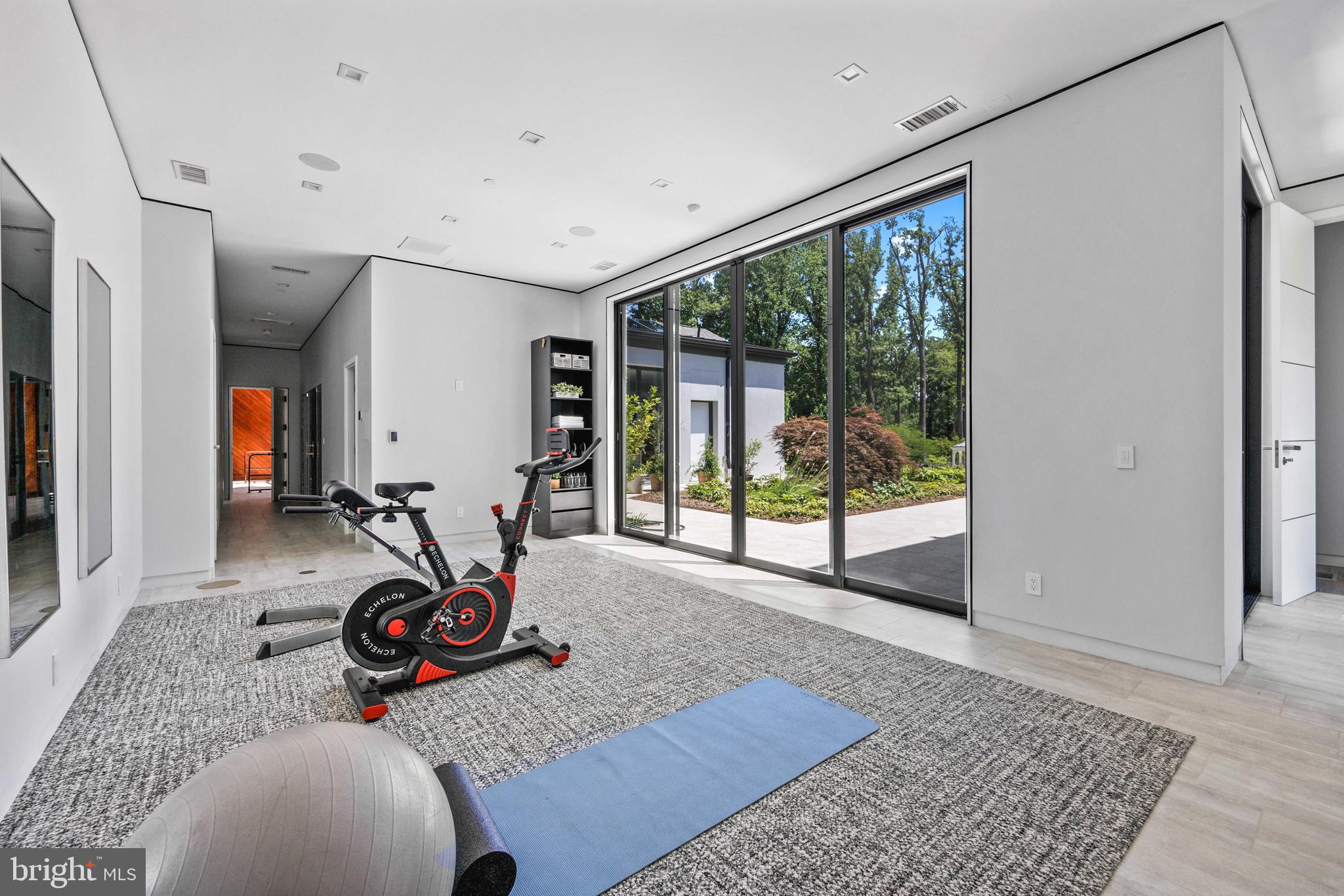 8801 Fernwood Road Bethesda, MD 20817 - Photo 29 of 48 a view of a room with gym equipment