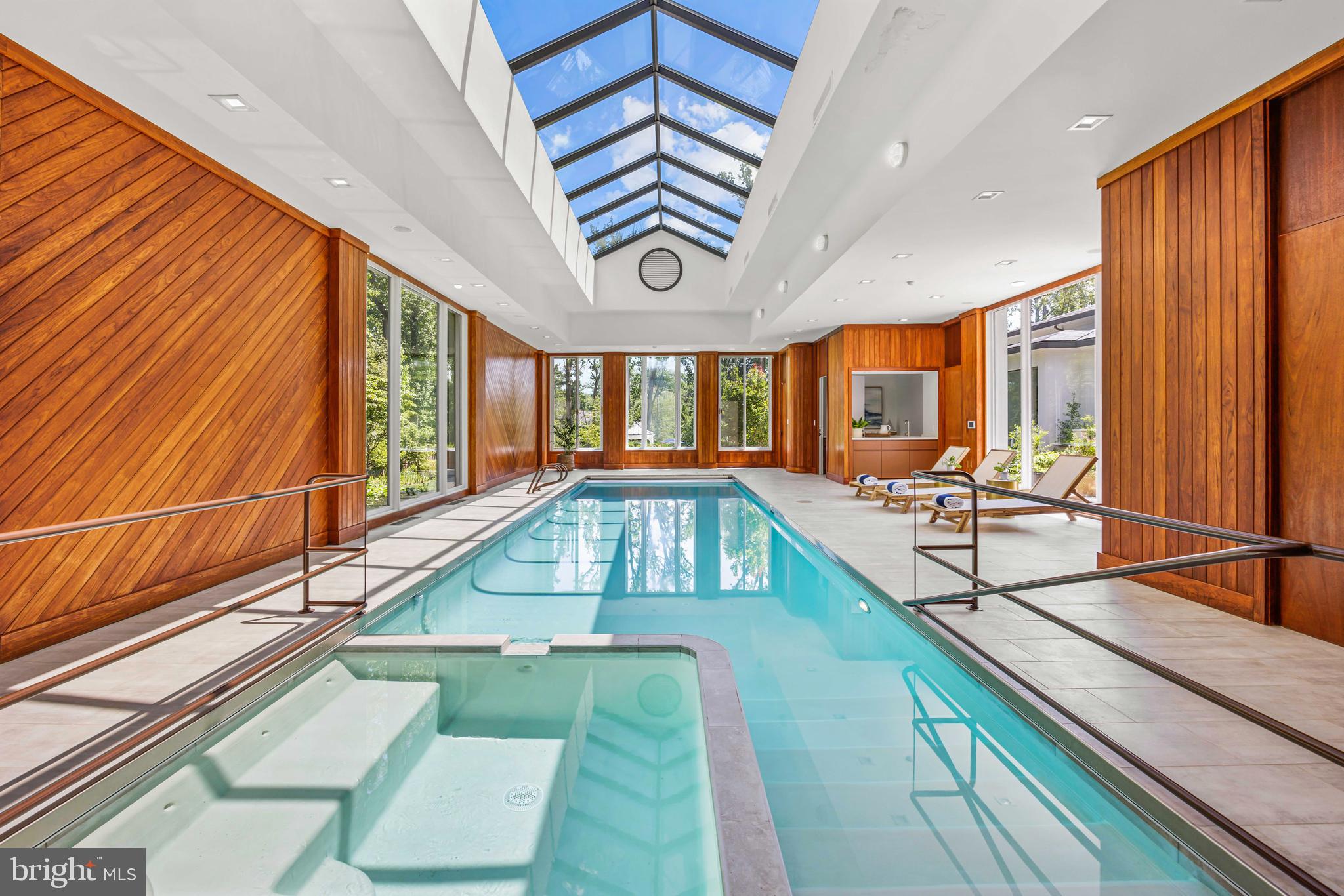 8801 Fernwood Road Bethesda, MD 20817 - Photo 33 of 48 a view of swimming pool with seating area