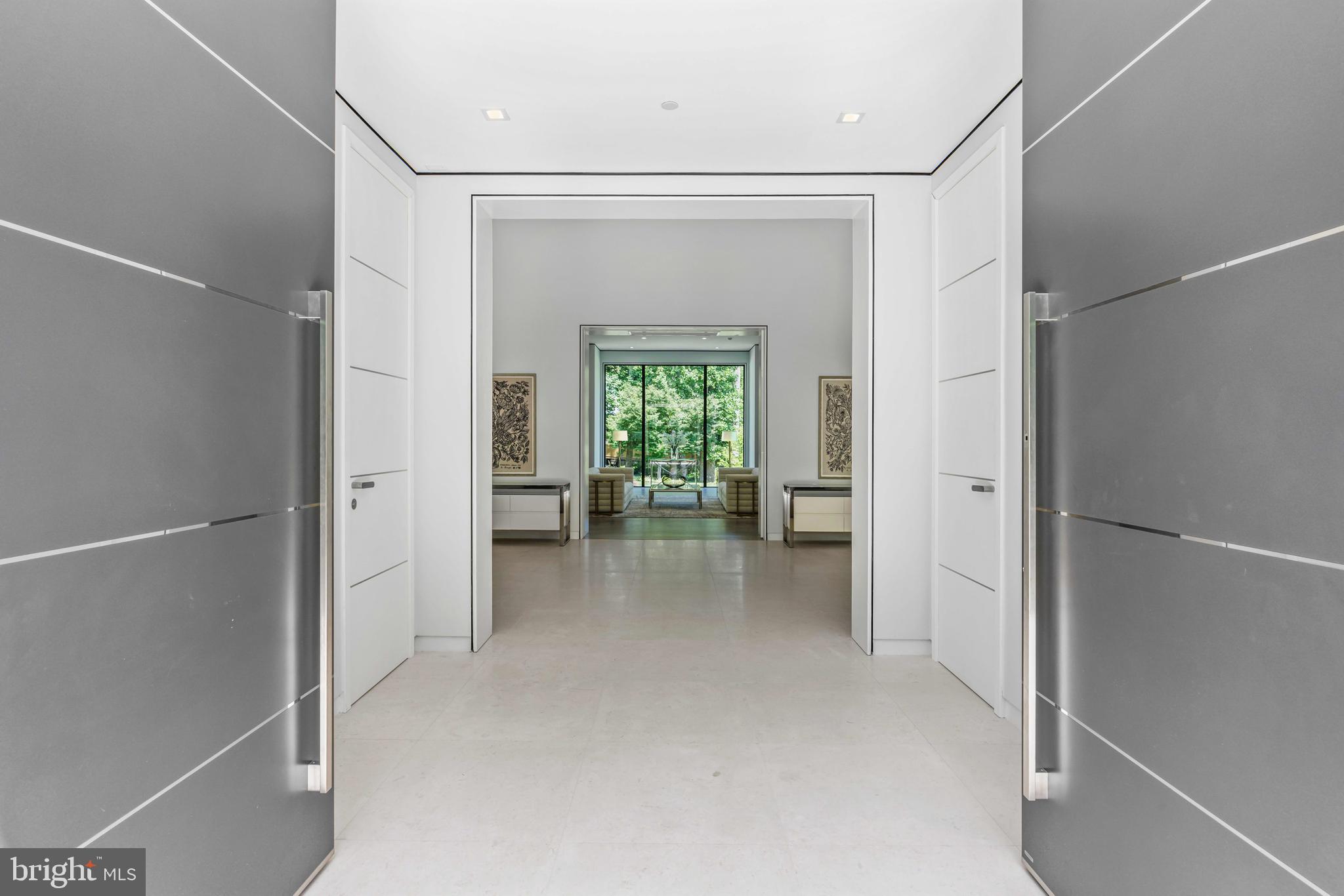 8801 Fernwood Road Bethesda, MD 20817 - Photo 4 of 48 a view of a hallway view with living room and window