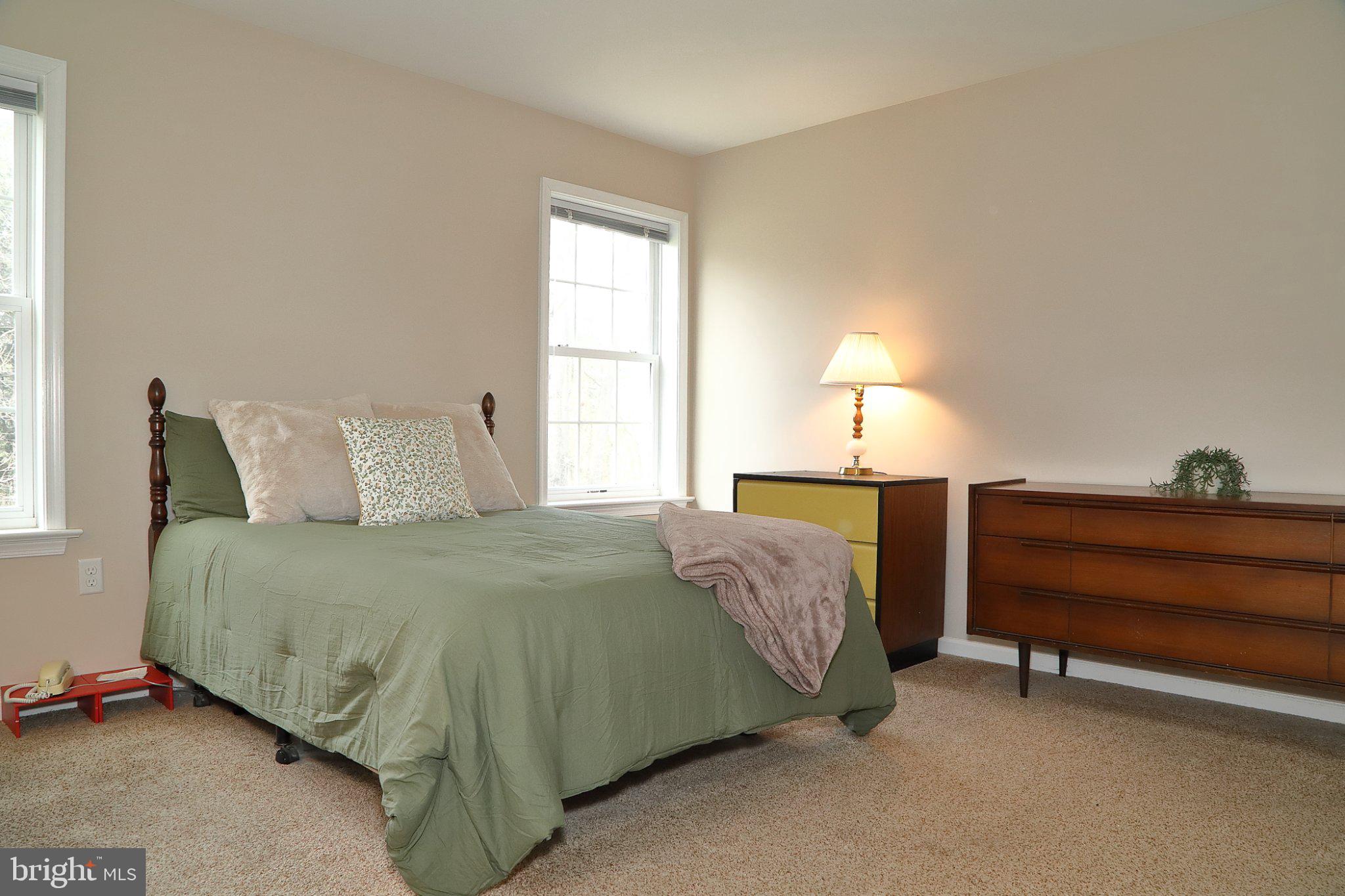 185 Waypoint Drive, Unit 236 Lancaster, PA 17603 - Photo 17 of 31 Serene bedroom with natural light.