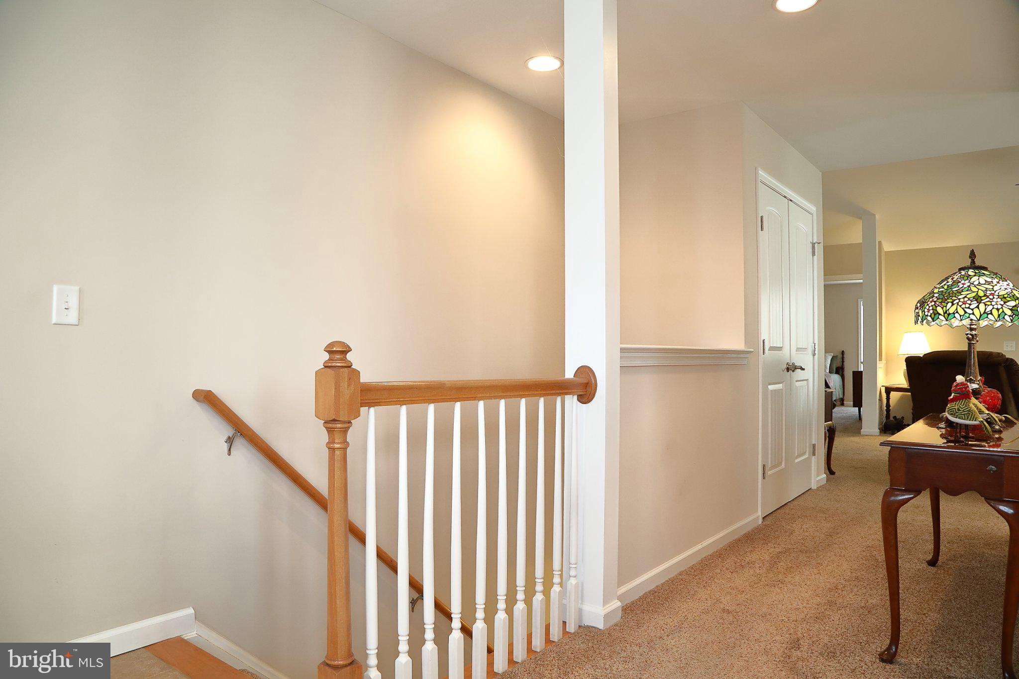 185 Waypoint Drive, Unit 236 Lancaster, PA 17603 - Photo 23 of 31 Inviting staircase in a cozy home.