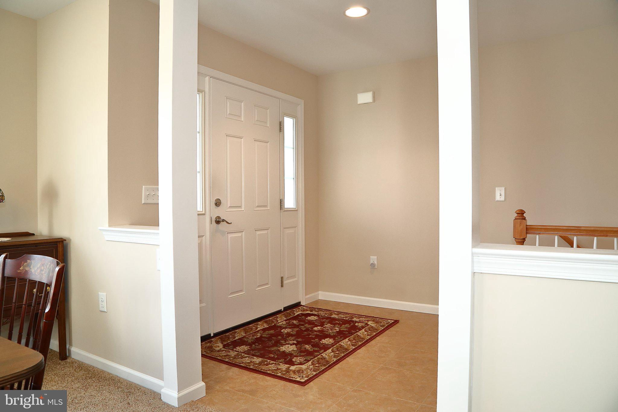 185 Waypoint Drive, Unit 236 Lancaster, PA 17603 - Photo 5 of 31 Welcoming entryway with charm.