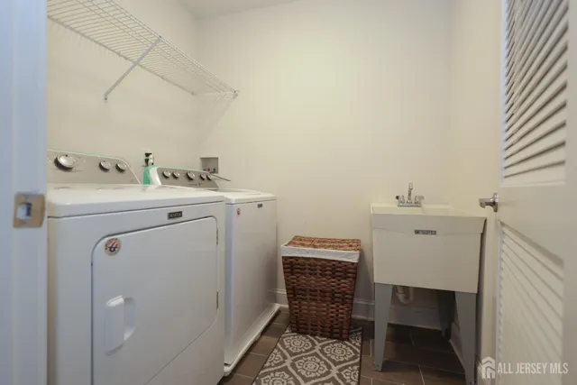 a bedroom with a bed and a desk