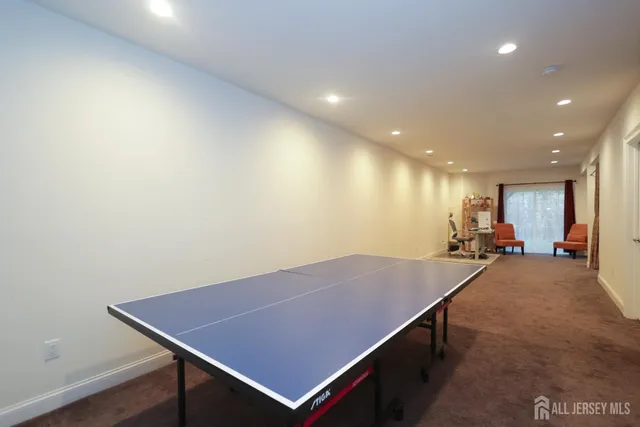 a view of a workspace with furniture