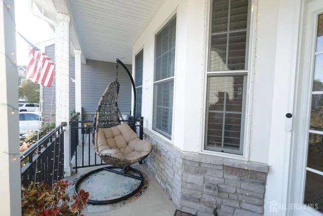 a view of door with wooden floor