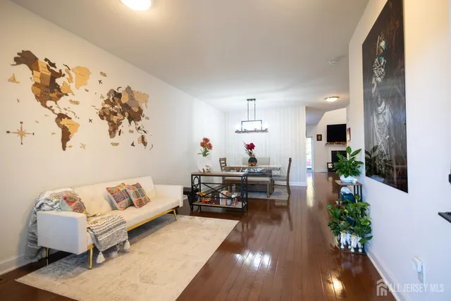 a dining room with a table and chairs
