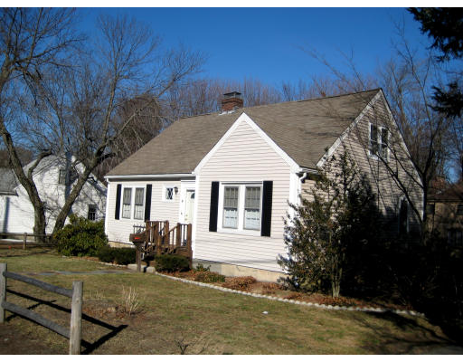 4 Cleveland Road Wellesley, MA 02481 - Photo 1 of 15 a view of a house with a yard