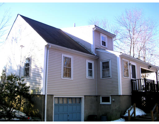 4 Cleveland Road Wellesley, MA 02481 - Photo 13 of 15 a view of a house with a yard