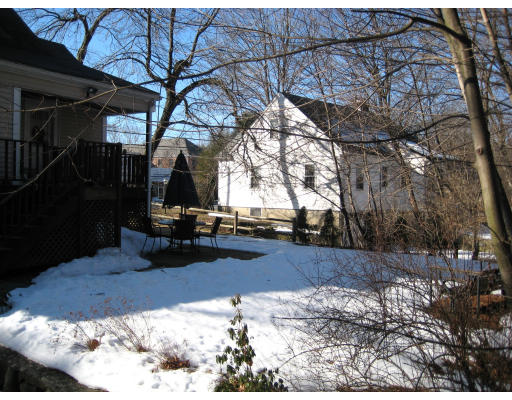 4 Cleveland Road Wellesley, MA 02481 - Photo 14 of 15 a view of a yard with a tree