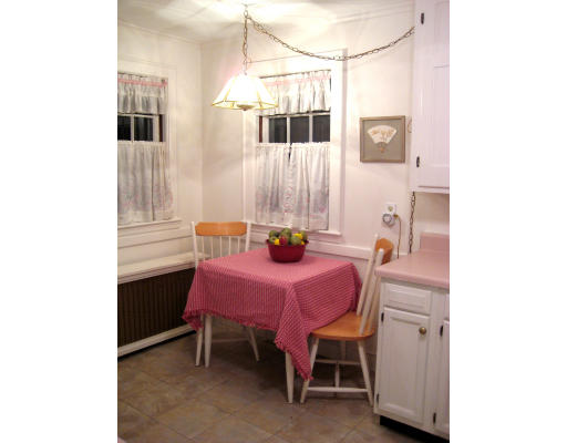 4 Cleveland Road Wellesley, MA 02481 - Photo 4 of 15 a view of a dining room with furniture and chandelier
