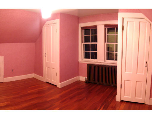 4 Cleveland Road Wellesley, MA 02481 - Photo 8 of 15 a view of a livingroom with wooden floor and a window