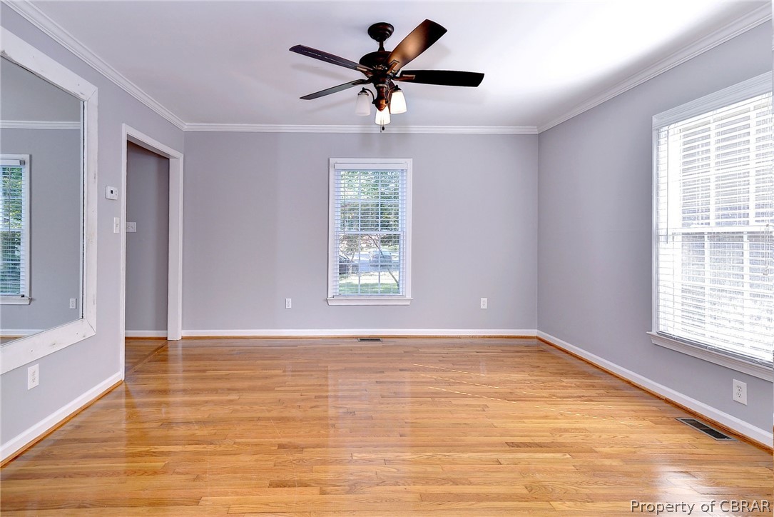 137 Wilderness Road Hampton, VA 23669 - Photo 29 of 45 Empty room with ceiling fan, light hardwood / wood-style flooring, and crown molding