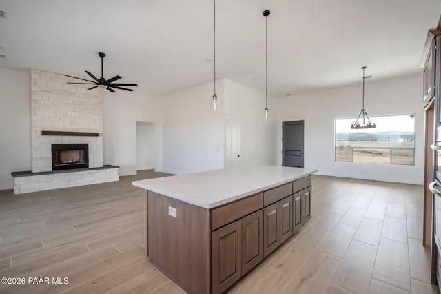 a kitchen with a cabinets and a stove