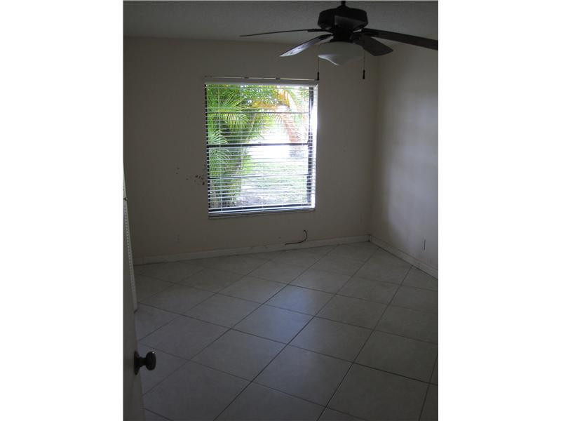 23490 Lyons Road, Unit 605 Boca Raton, FL 33428 - Photo 5 of 14 Exterior Front