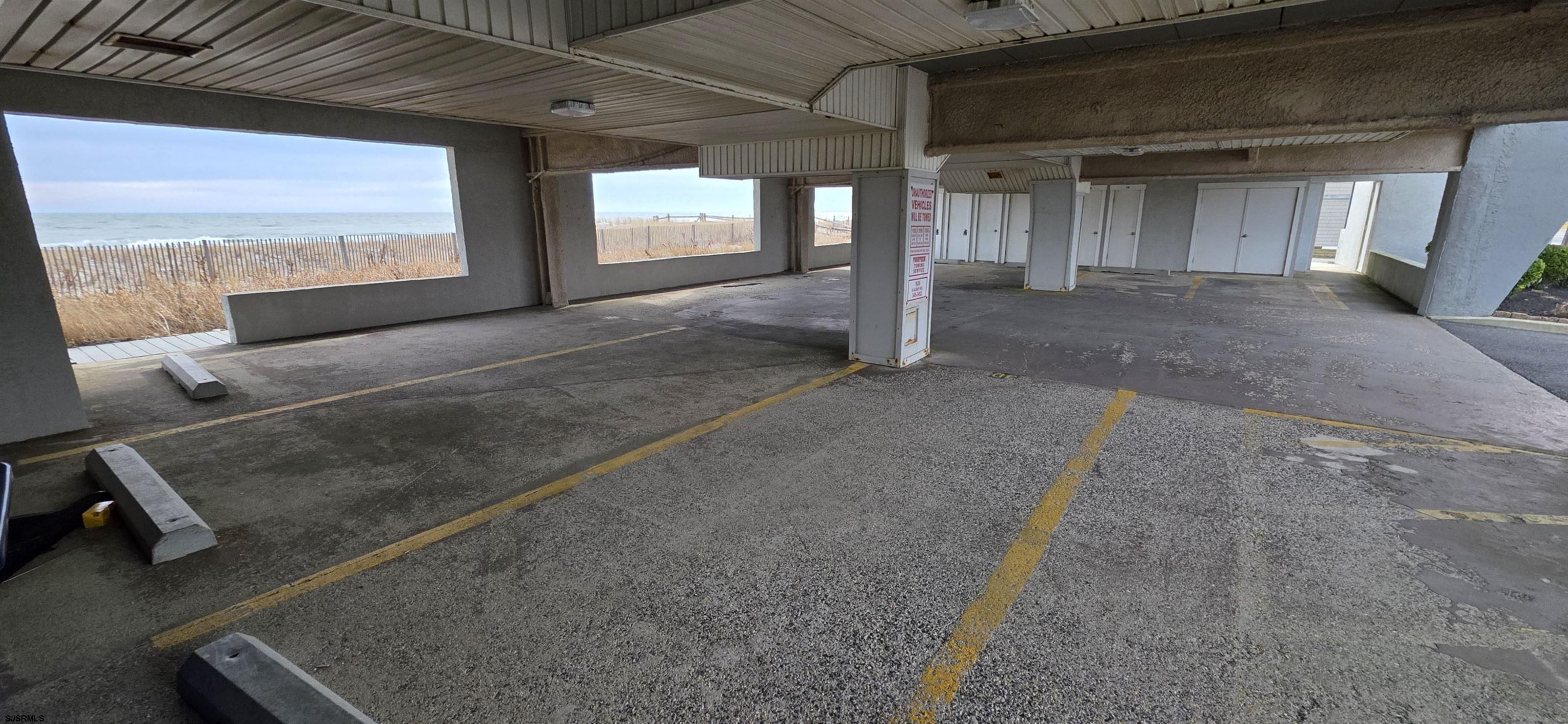 700 East Brigantine Avenue, Unit 2D Brigantine, NJ 08203 - Photo 19 of 21 a view of an empty room with a fireplace