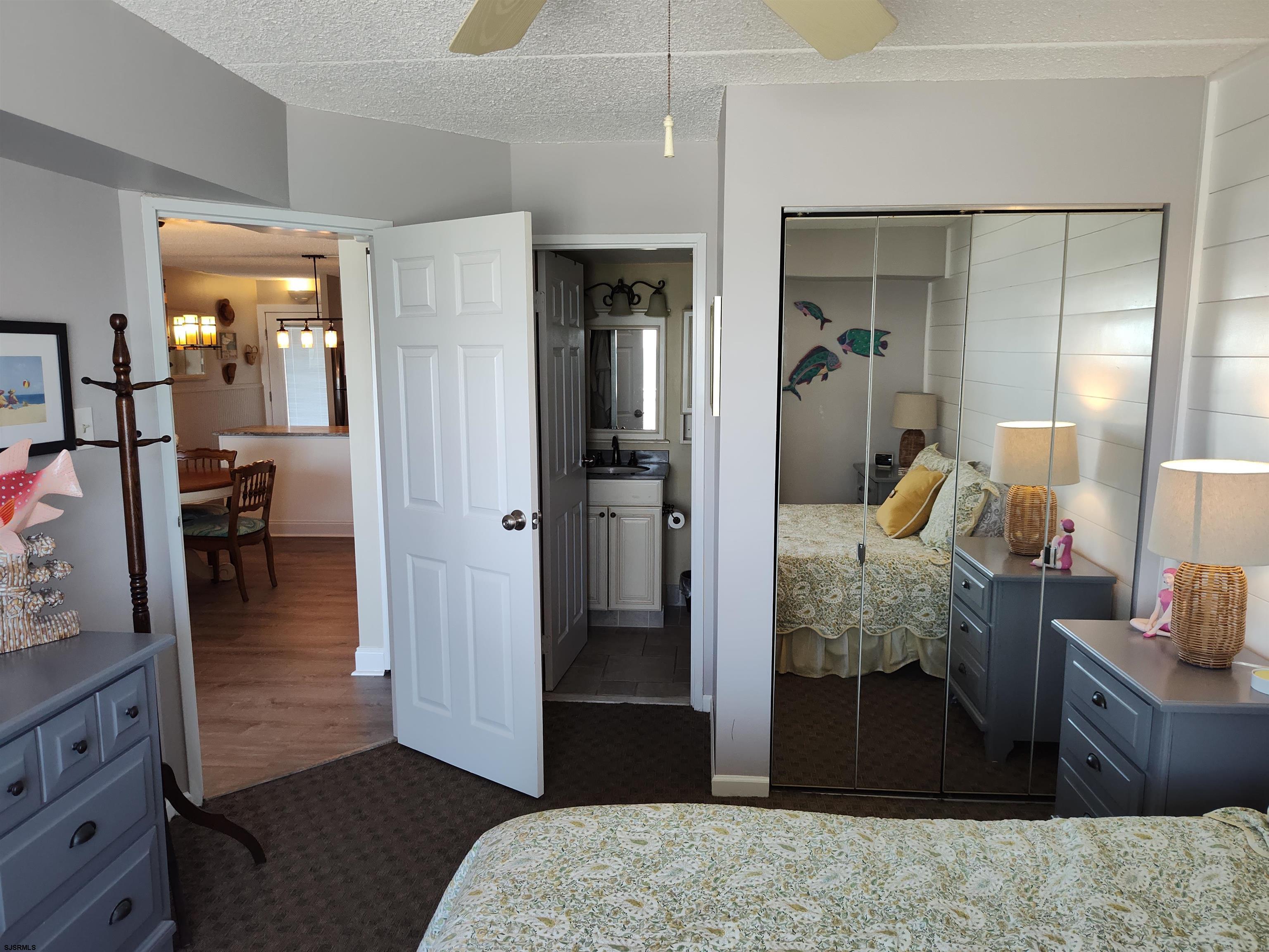 700 East Brigantine Avenue, Unit 2D Brigantine, NJ 08203 - Photo 10 of 21 a living room with furniture and a wooden floor